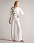 RAILI-Knitwear-Luxury and loungewear collide in the RAILI jumper. Featuring a relaxed fit in a breathable cotton and linen blend, the true standout of this piece is the floral satin front. Perfect for a day out with friends or a casual date, it offers both comfort and style. Jumper Botanical bouquet print Satin front Cotton and linen blend V-neck 3/4 length sleeves Round hem Jara is 5'10.5" / 1.79cm and wears White in a Ted size 1- Ted Baker Romania